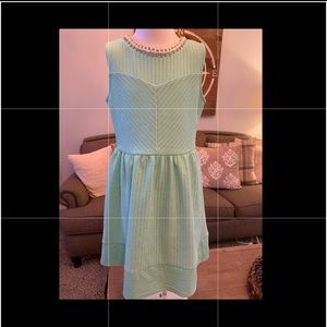 Dress with jeweled neck